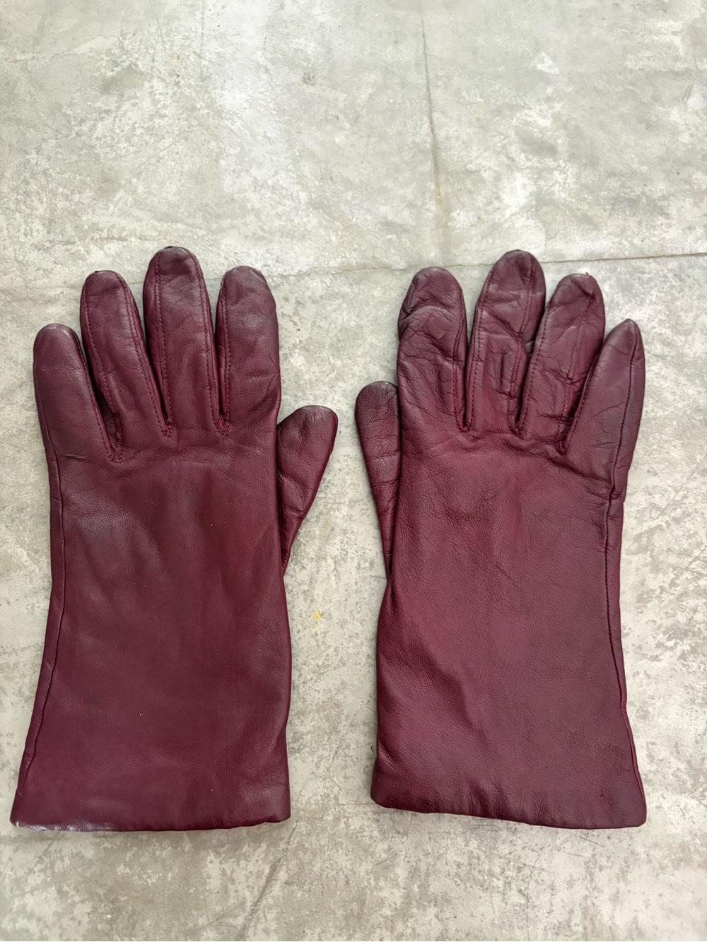vintage-style burgundy leather gloves